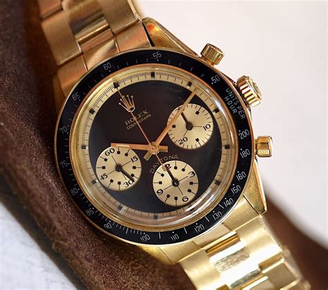 rolex daytona paul newman gold.